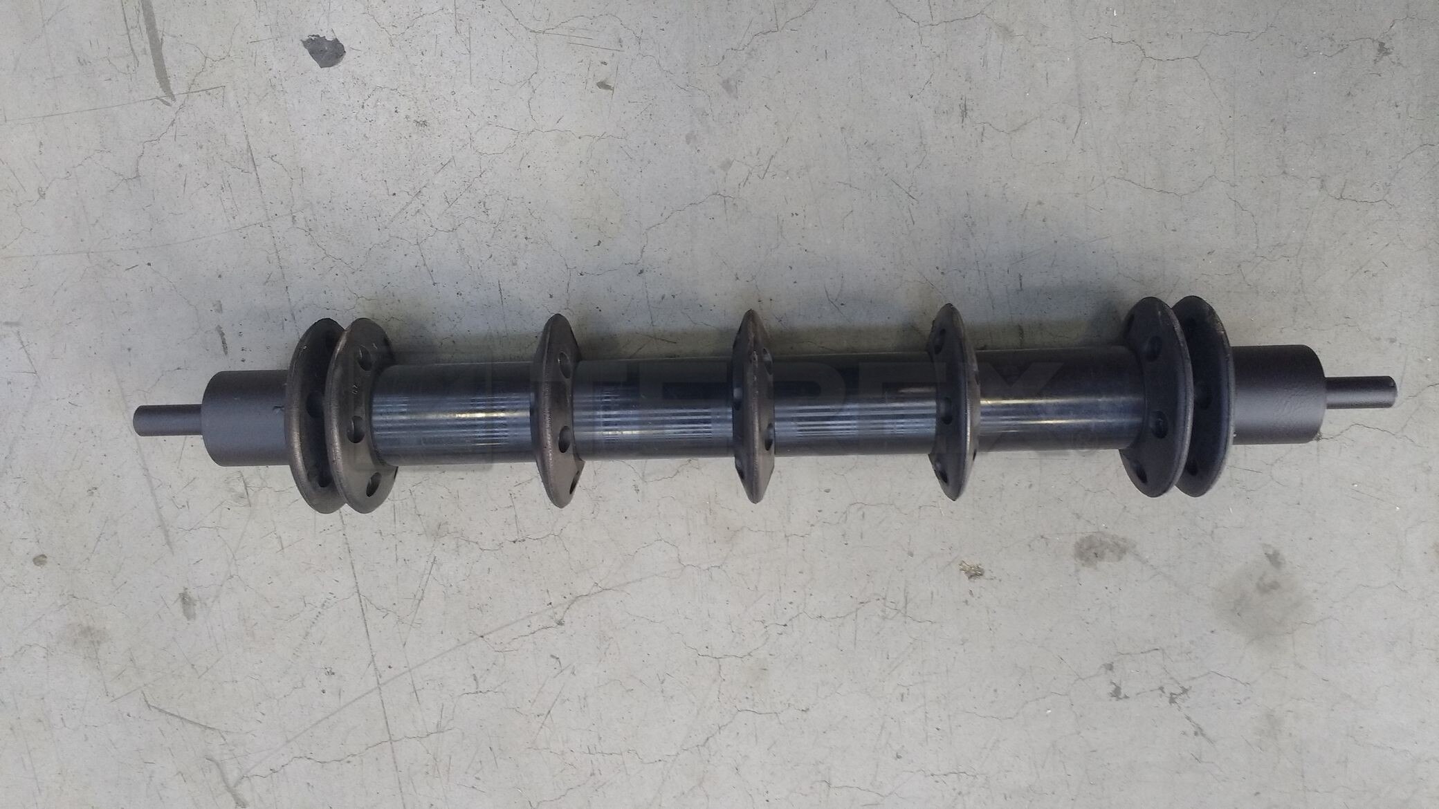 DISC RETURN ROLLER L980 C/W SPACERS