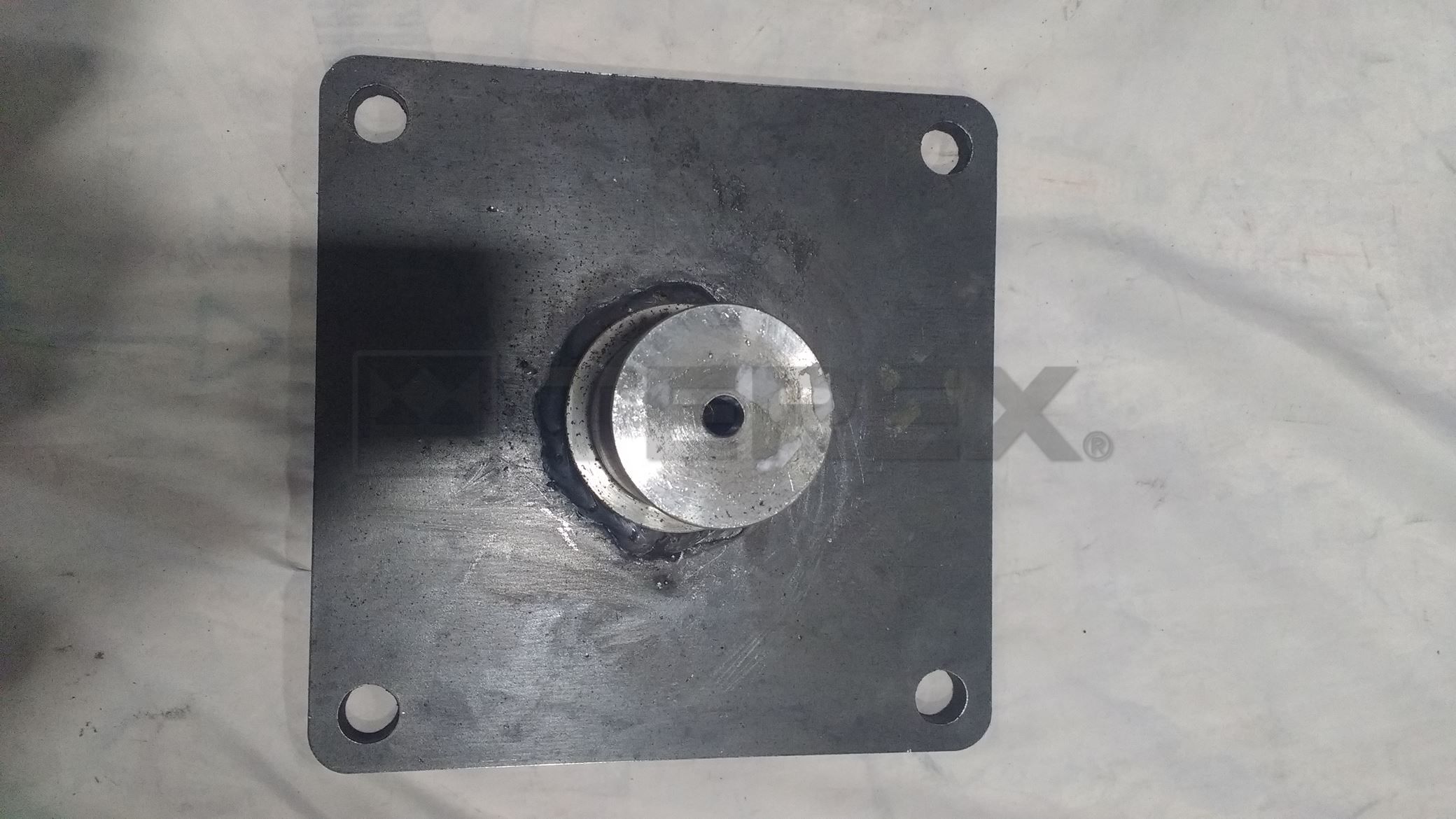 TROMMEL GUIDE WHEEL MOUNTING