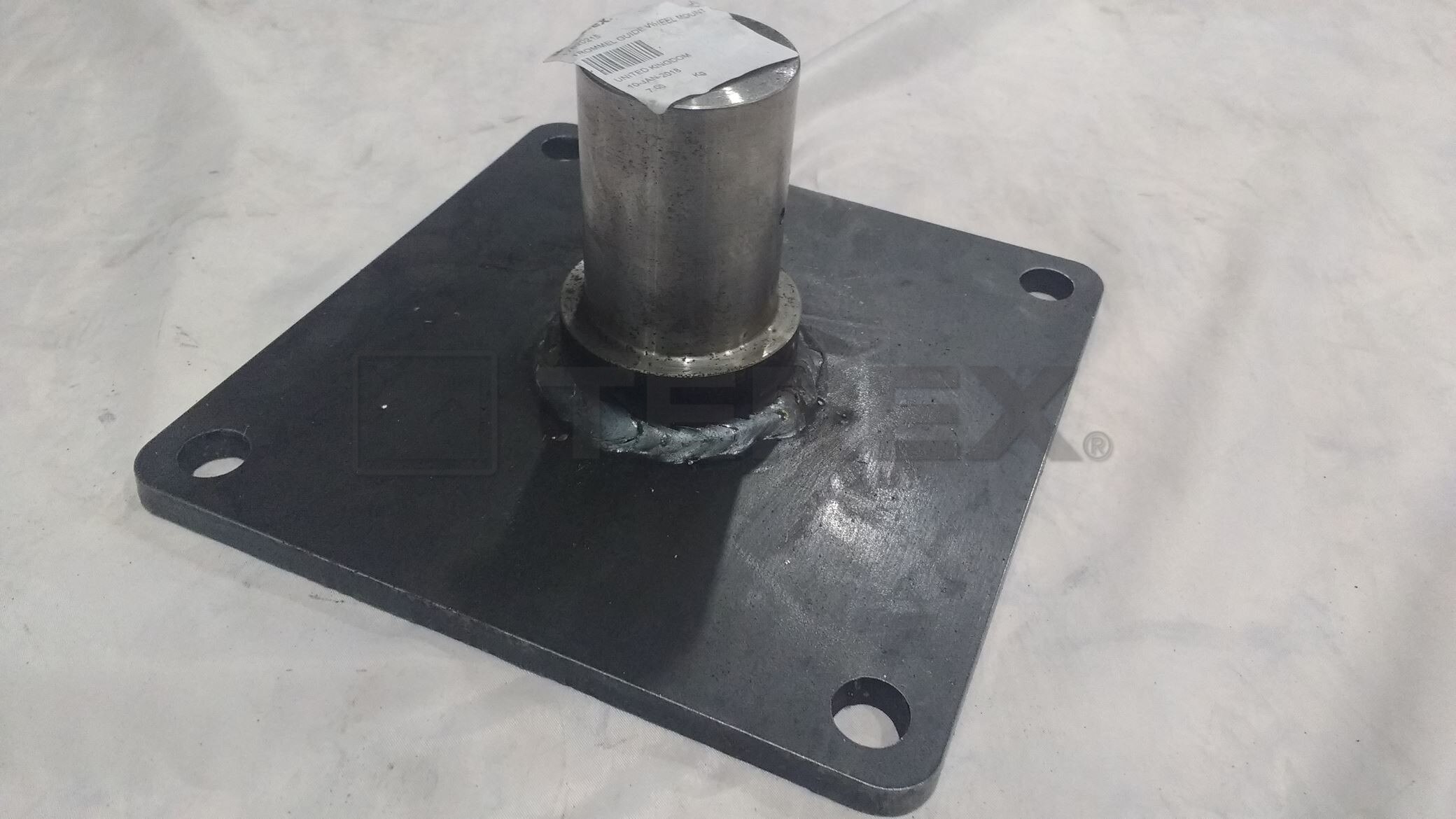 TROMMEL GUIDE WHEEL MOUNTING